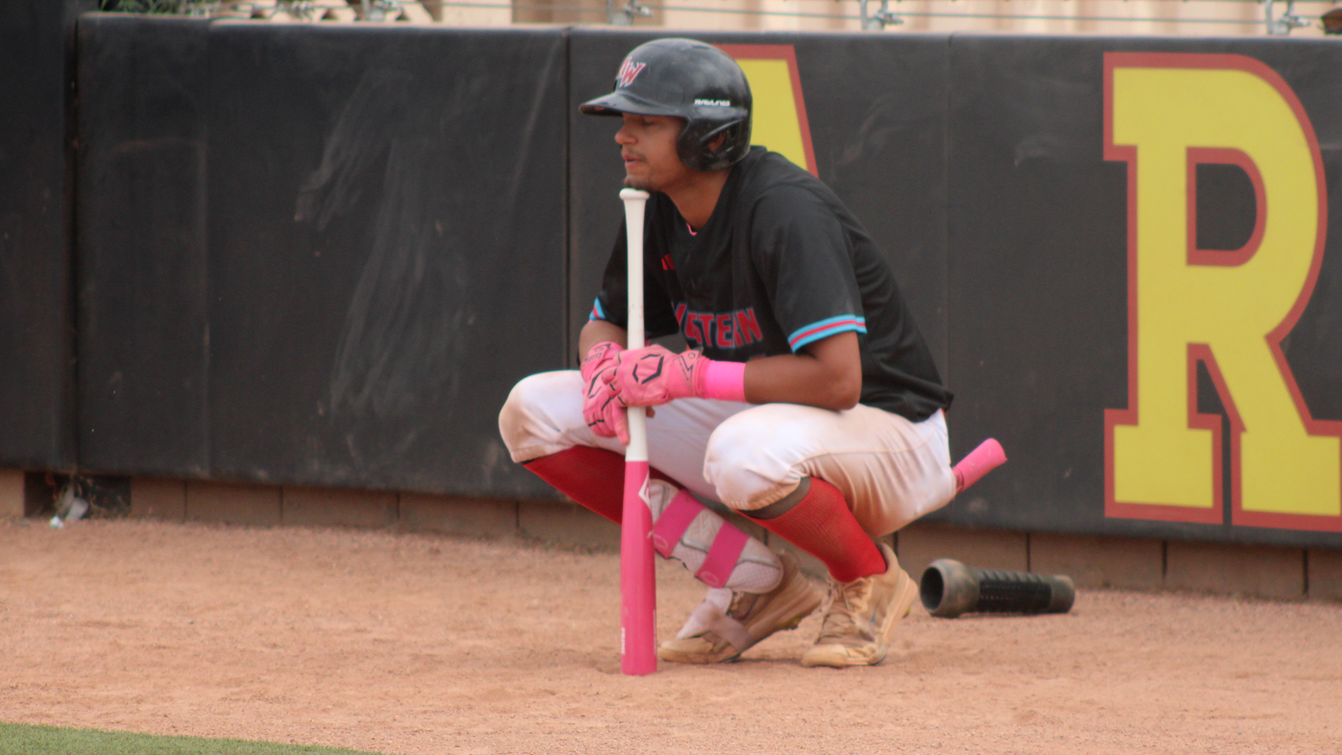 Jamie Beerman waits to bat versus Central Arizona. Photo by Shayden Aguigui