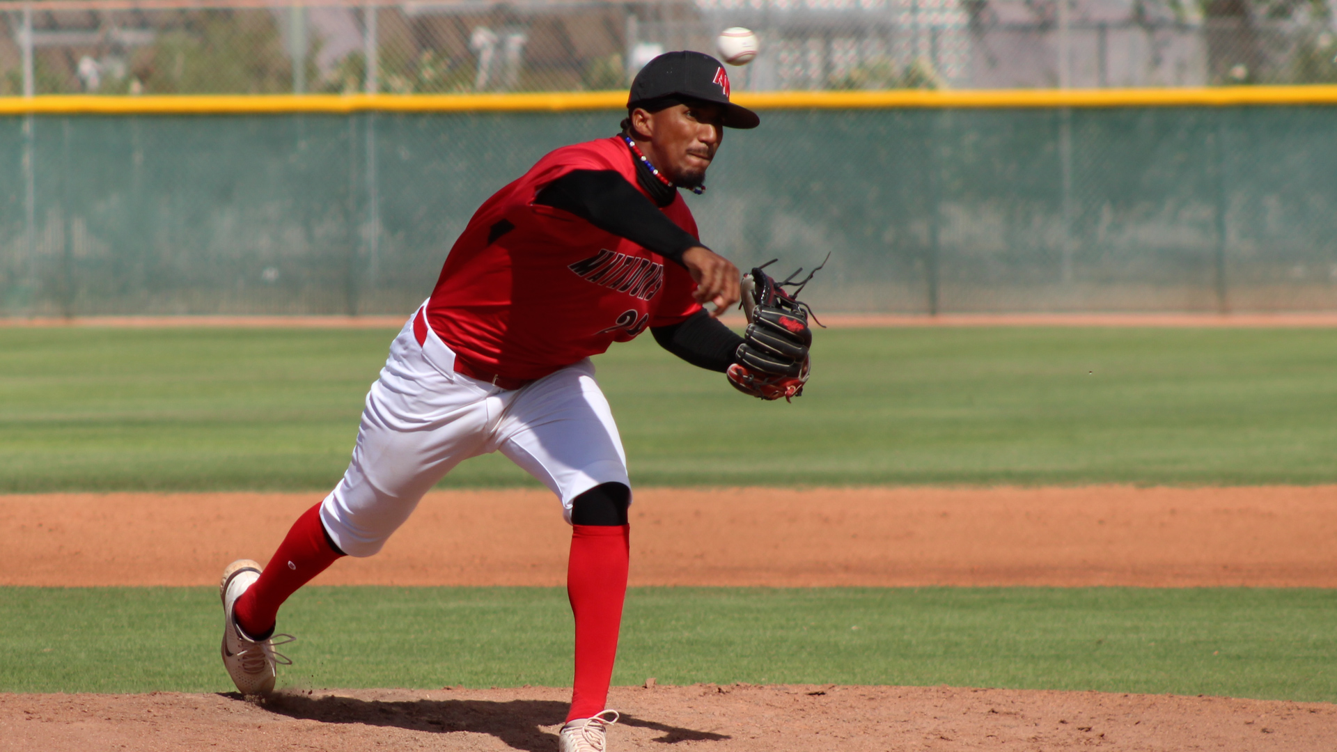 Gregory Mateo pitches from the mound versus Cochise College at Walt Kammann Field. Photo by Shayden Aguigui