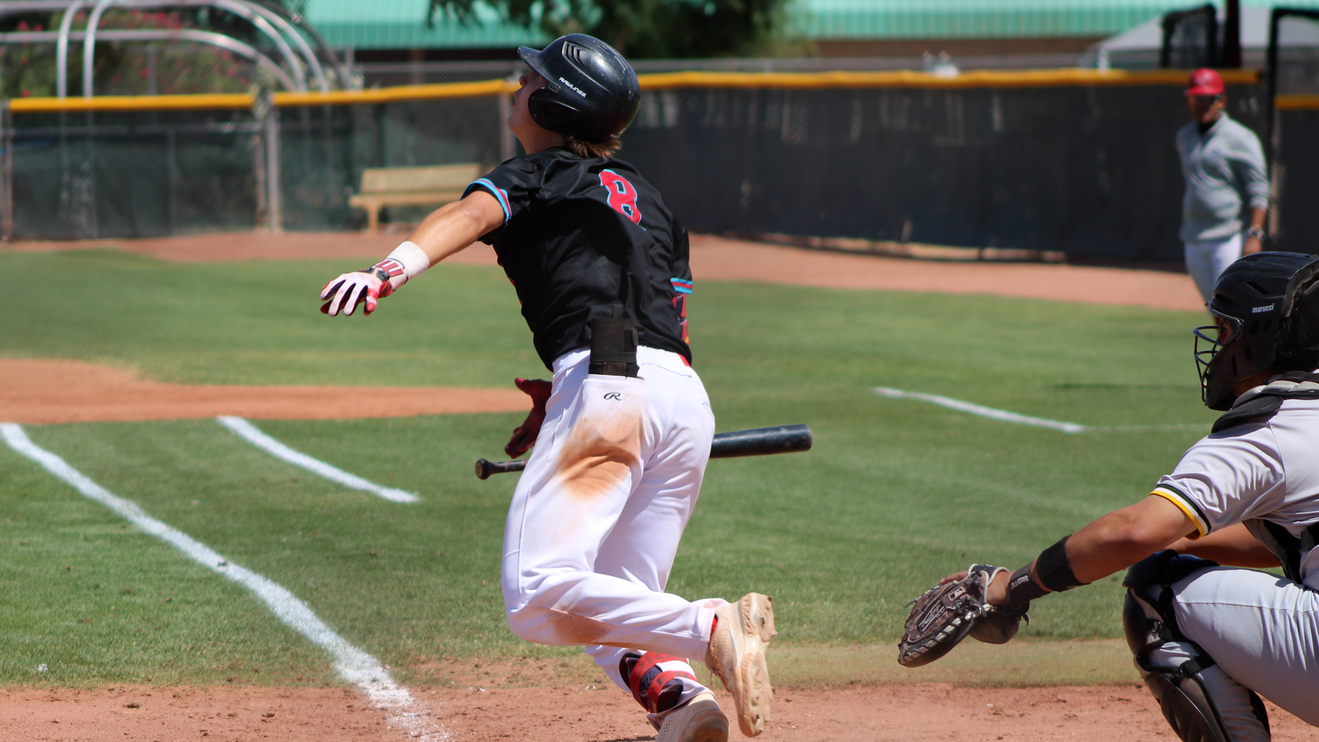 Elias Huber races out of the batter's box at Walt Kammann Field. Photo by Shayden Aguigui